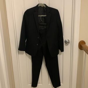Calvin Klein boys slim fit suit size 12. 2 piece set black. Like new/dry cleaned